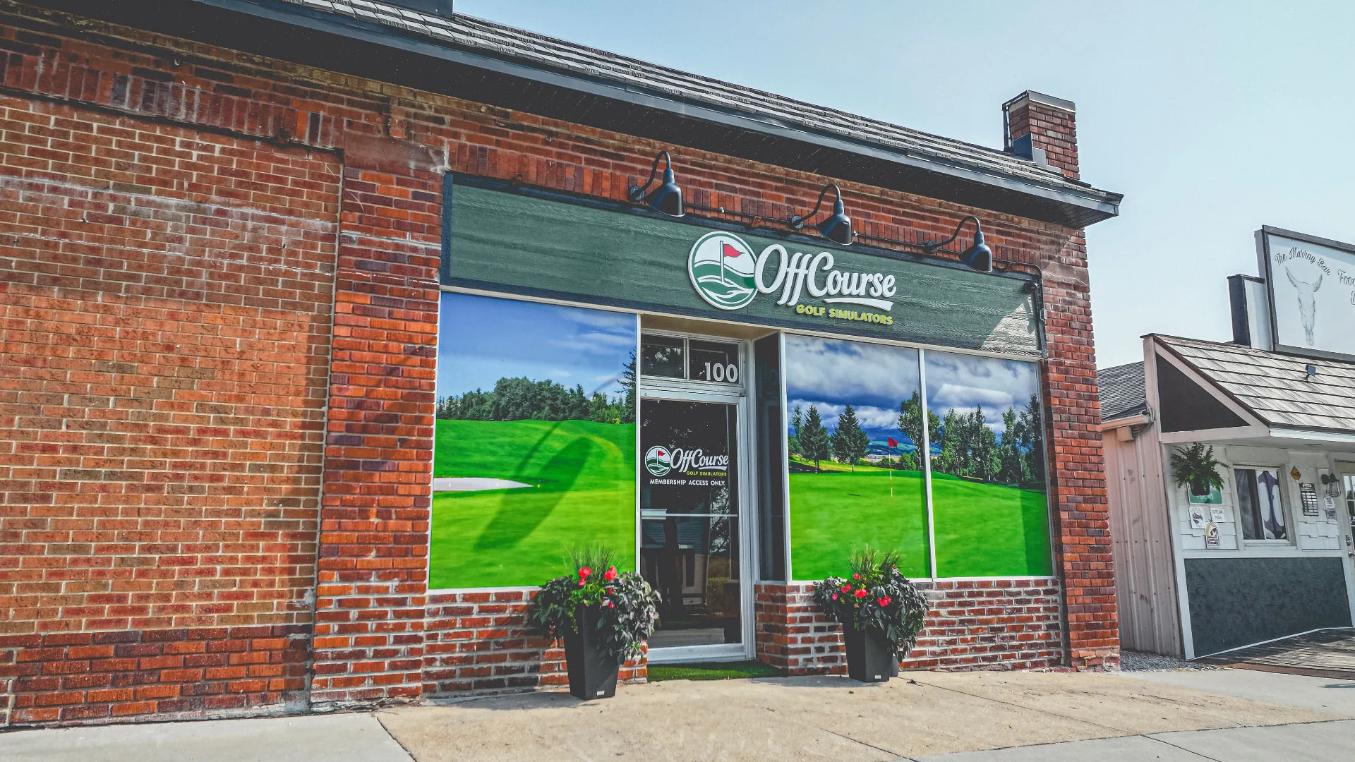 The Off Course storefront at 100 E Main Street